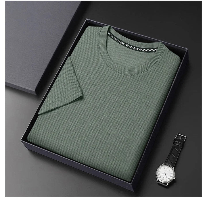 Front view of a men's modern waffle knit t-shirt in a crew neck style