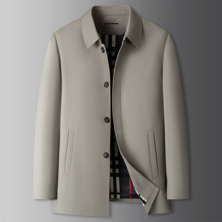 Detail shot of the zipper and collar on a men's spring Harrington jacket