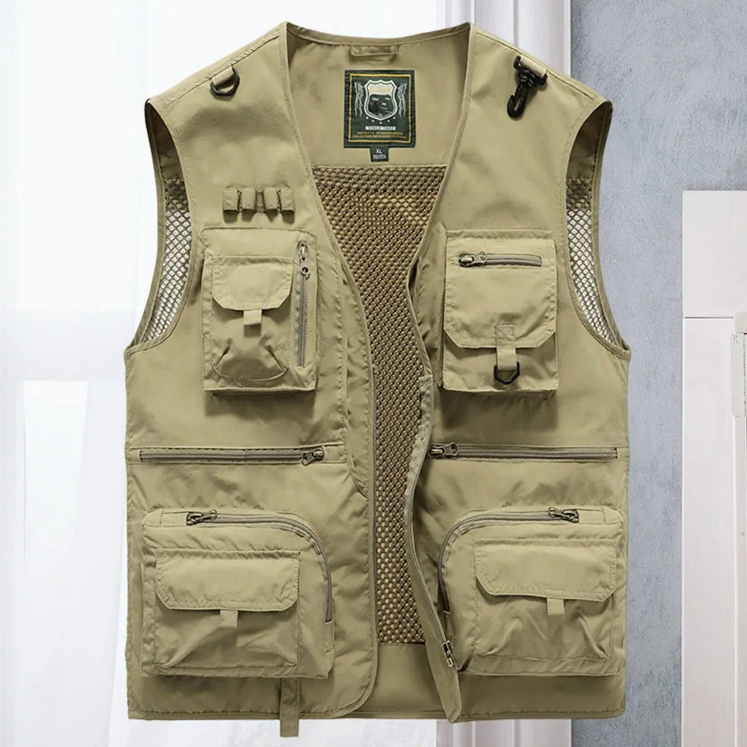 Men's rugged outdoor vest, multi-pocket for gear storage during fishing & hiking expeditions.