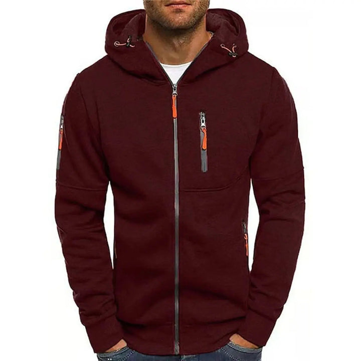 Casual men's hooded sweatshirt with multi-pockets, full zip, and soft knit sweater feel fleece.