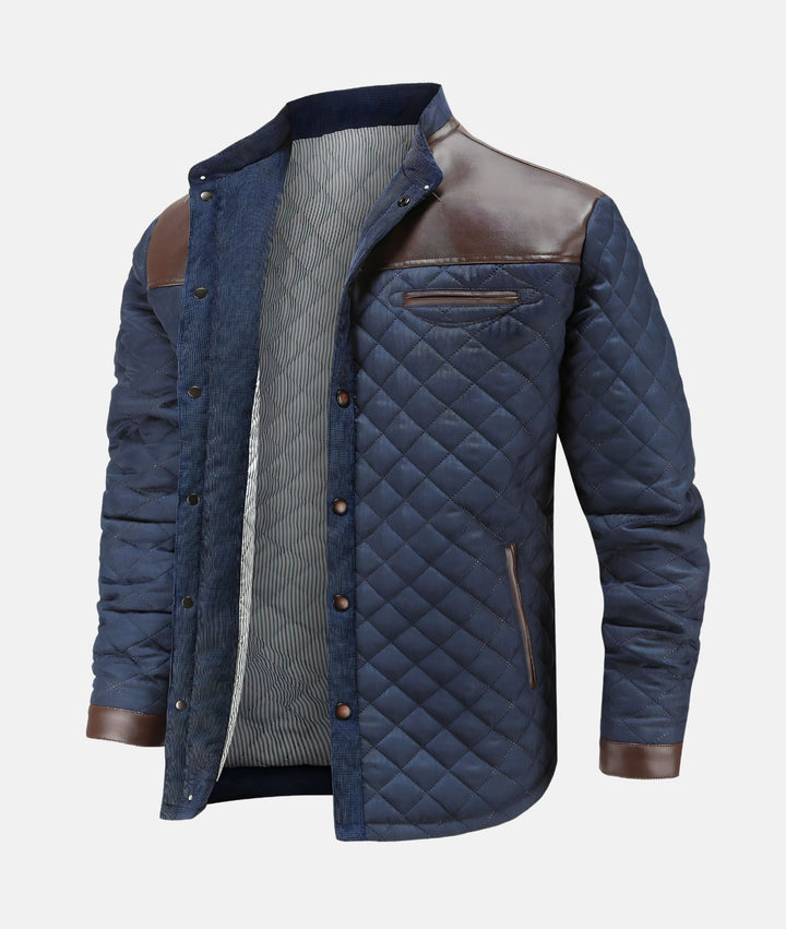 Collarless men's navy blue quilted jacket with button-down front, perfect for fall & winter layering.