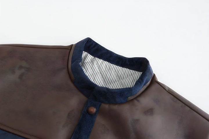 Comfortable men's navy blue button-down quilted jacket, collarless style for casual fall outerwear.