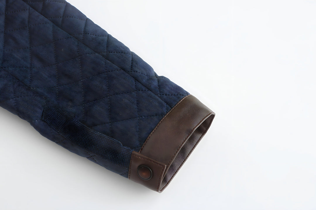 Men's collarless navy blue quilted jacket, button-down for casual comfort & winter layering.