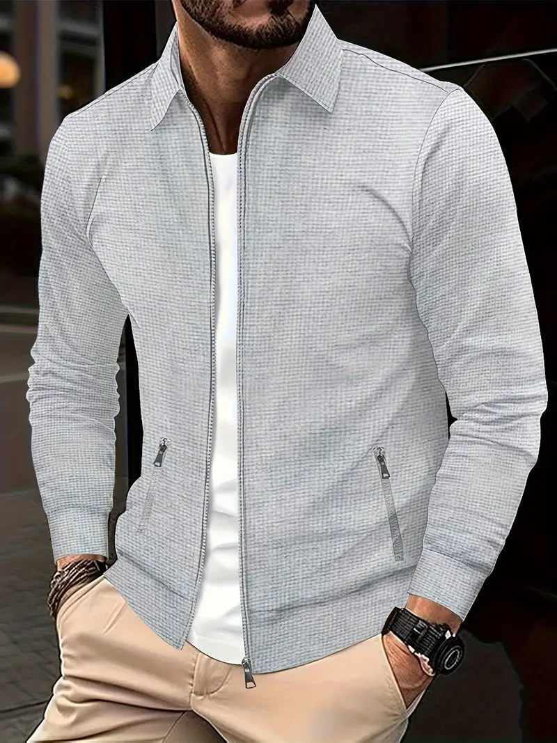 Front view of a men's light grey zip-up shirt, showcasing its modern design.