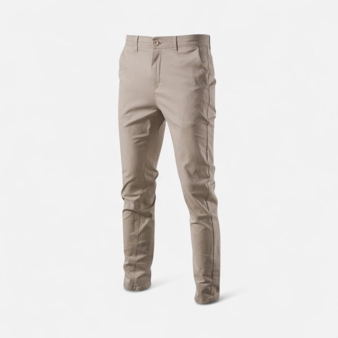 Detail shot of men's smart casual chinos, highlighting the tailored waistband.