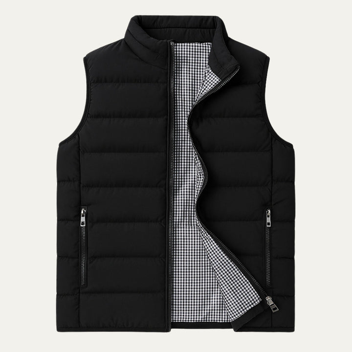 Black men's puffer vest with stand collar. Versatile sleeveless jacket for mens fashion. Ideal casual outerwear for fall/winter.
