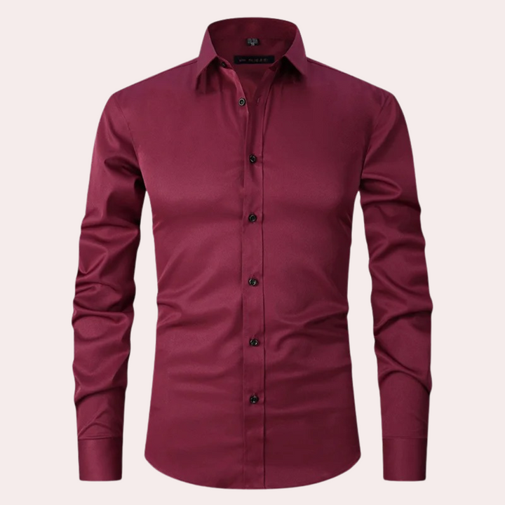 Comfortable men's stretch dress shirt. Non-iron fabric ensures a sharp, wrinkle-free, slim fit look all day.