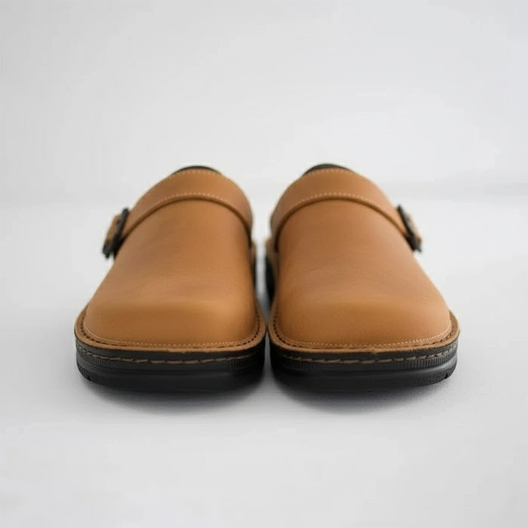 Men's orthopaedic leather slip-on clogs in brown, offering all-day comfort and arch support.