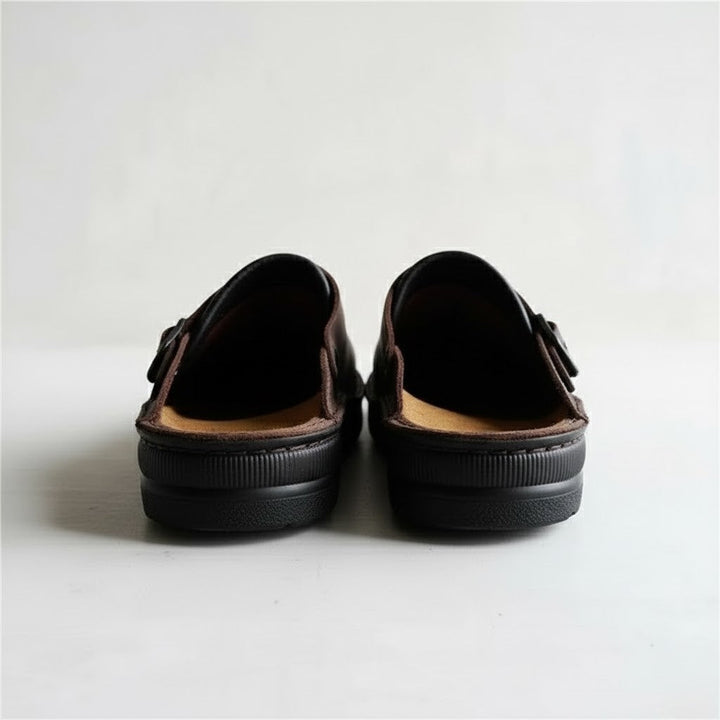Men's slip-on orthopaedic clogs made from premium leather, ensuring breathability and comfort.