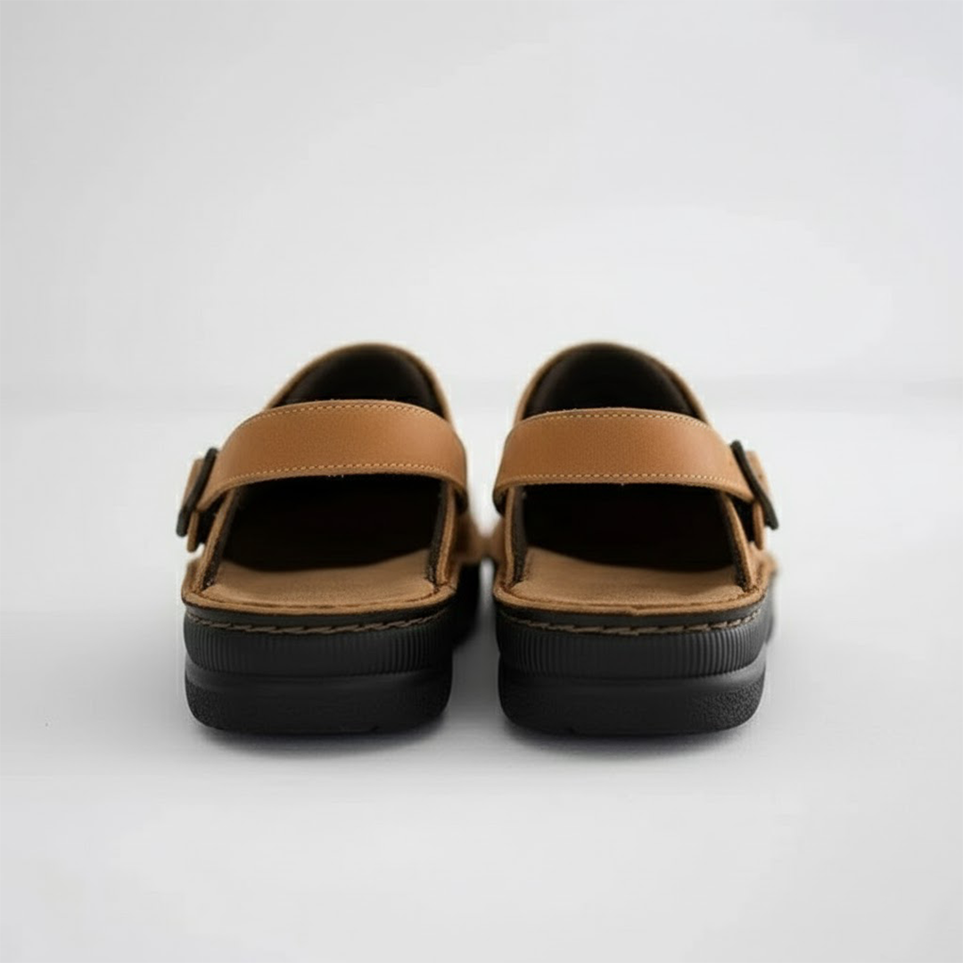 Side view of men's casual leather clogs with orthopaedic features for superior comfort and support.