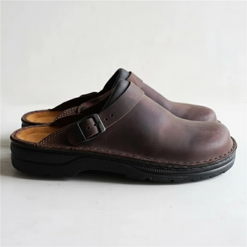 Stylish men's leather clogs with an orthopaedic design, perfect for casual outings and travel.