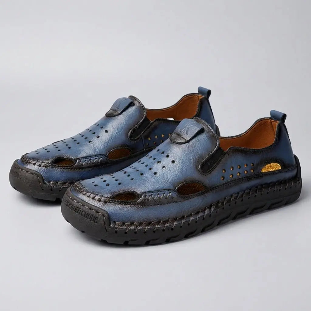 Premium men's orthopedic closed-toe sandals with hand-stitched detail, breathable material, and arch support.