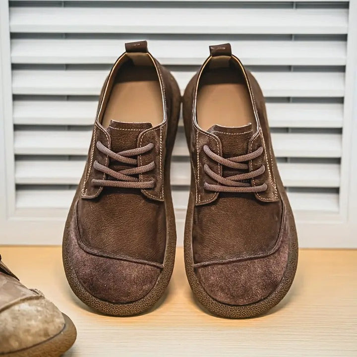 Men's comfort shoes in a home setting, perfect for daily wear, foot support & versatile style.