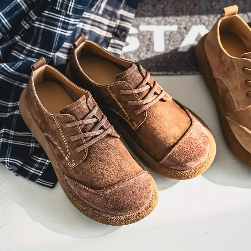 Men's stylish orthopedic shoes in an outdoor setting, ideal for comfortable walking & daily fashion.