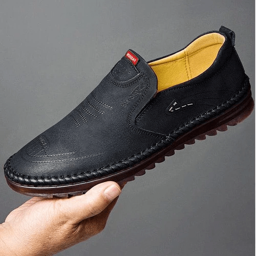 Side view of men's orthopedic comfort footwear, highlighting ergonomic design, durable sole, & all-day support.