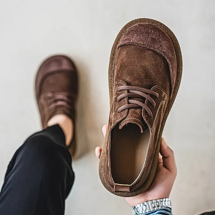 Comfortable men's dress shoes with orthopedic support for foot health & everyday wear.