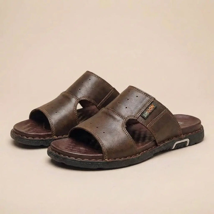 Comfortable men's wide fit orthopedic slip-on sandals, ideal for daily wear & foot support.