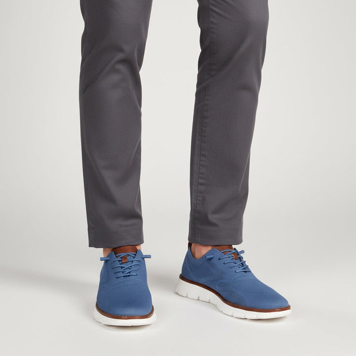 Breathable men's walking shoes with anti-slip sole, ensuring comfort and stability for daily use.