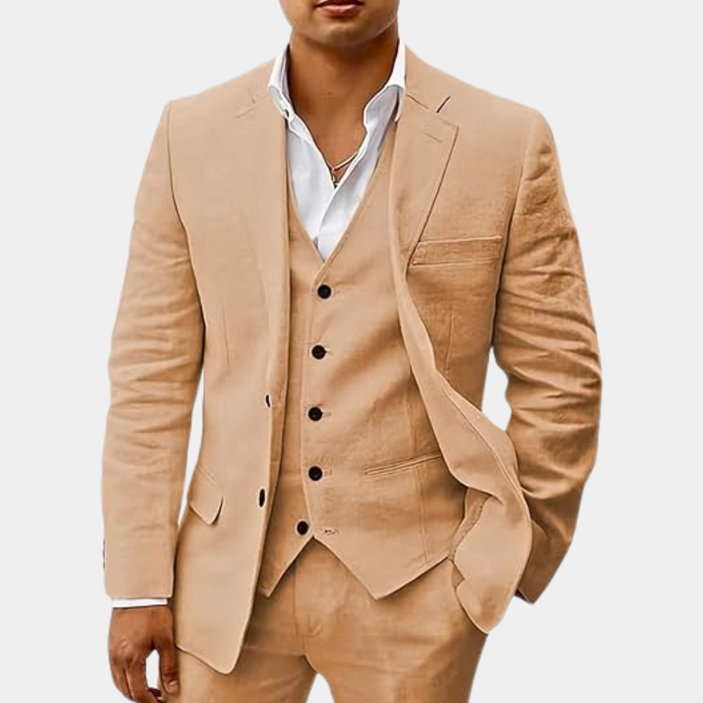 Man wearing a stylish three-piece suit with waistcoat, perfect for weddings.
