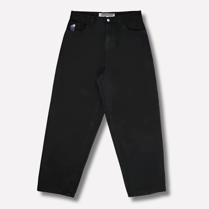 Close-up of men's wide leg skater jeans, showing durable denim fabric and relaxed fit.