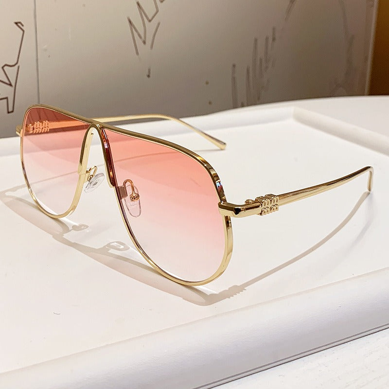 Bold men's oversized aviator sunglasses. Metallic frame, gradient lenses. High fashion luxury eyewear.