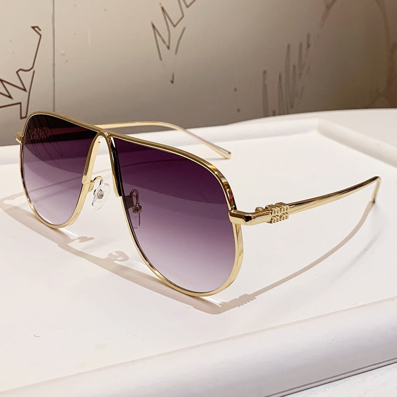 Trendy men's oversized aviator sunglasses, luxury metallic frame & gradient lenses for modern fashion eyewear.