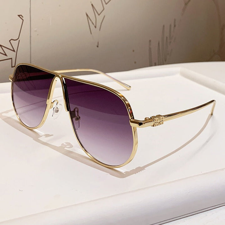Trendy men's oversized aviator sunglasses, luxury metallic frame & gradient lenses for modern fashion eyewear.