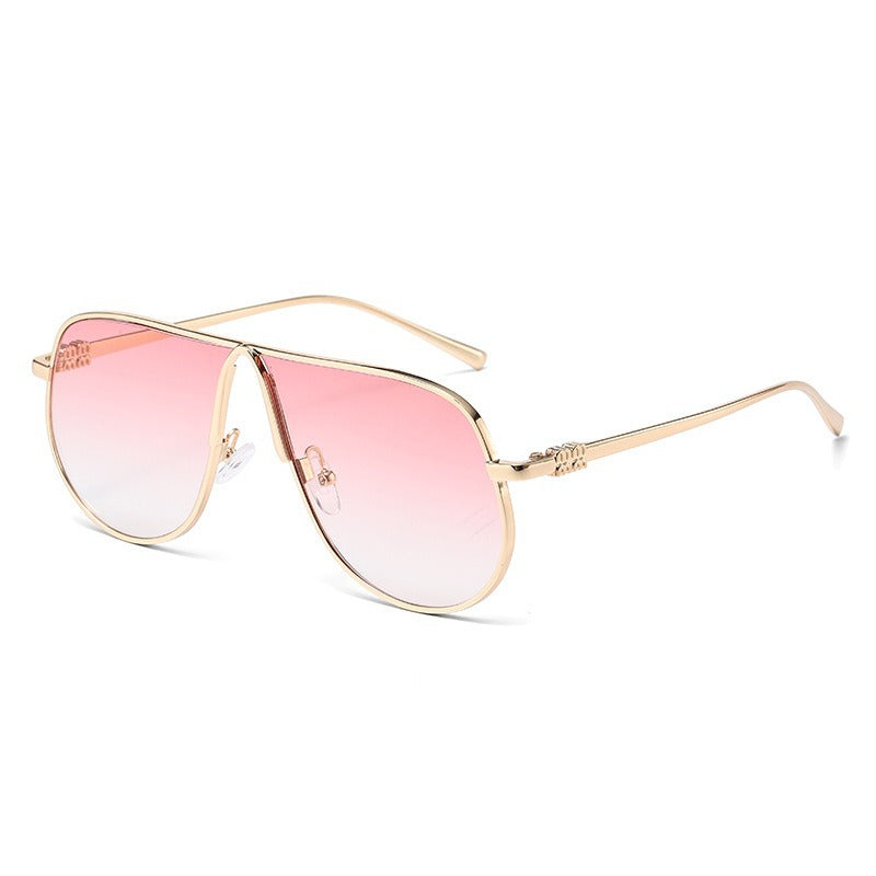 Premium men's oversized aviator sunglasses, sleek metallic frame, gradient lenses. Fashionable luxury eyewear.