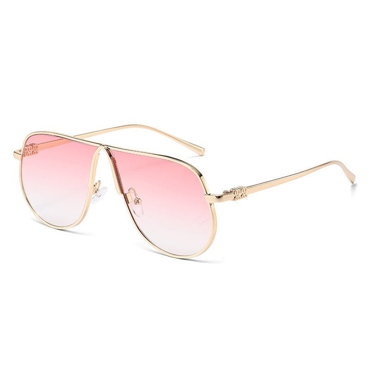 Premium men's oversized aviator sunglasses, sleek metallic frame, gradient lenses. Fashionable luxury eyewear.