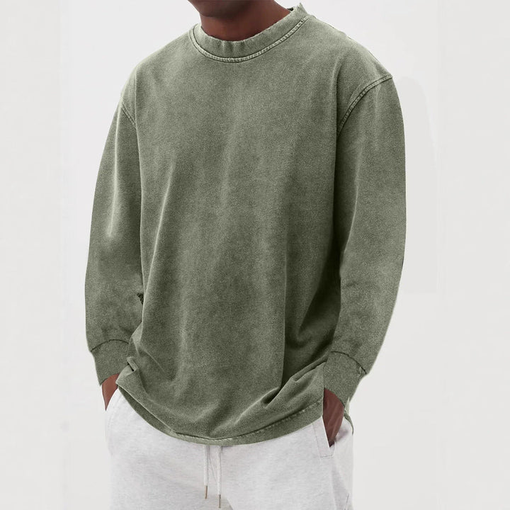 Modern men's oversized sweater, a stylish casual pullover for contemporary fashion.