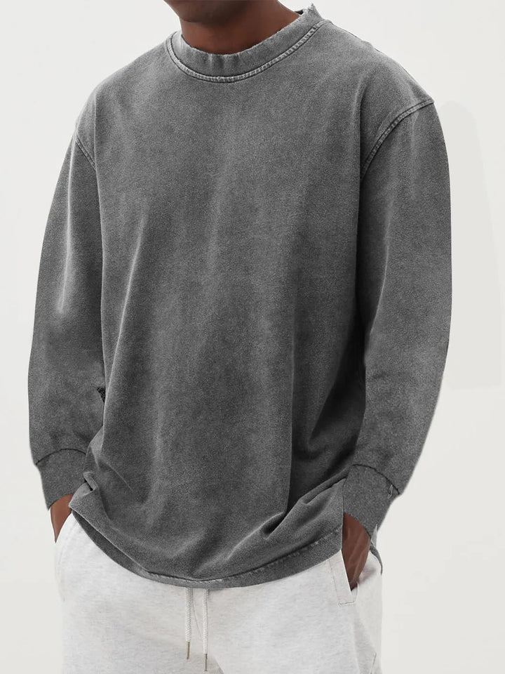 Men's comfortable oversized crew neck sweater, essential men's apparel for cool weather.
