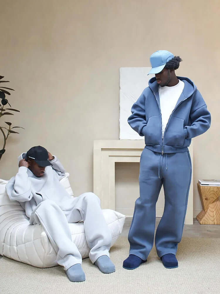 Grey men's oversized casual tracksuit set, a comfortable two-piece hoodie & joggers for relaxed style.