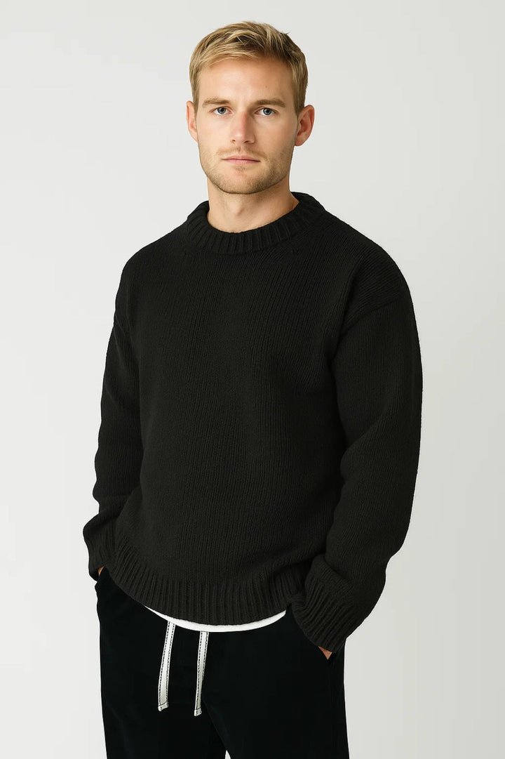 Men's oversized crew neck pullover sweater in a soft knit, perfect for casual everyday comfort.