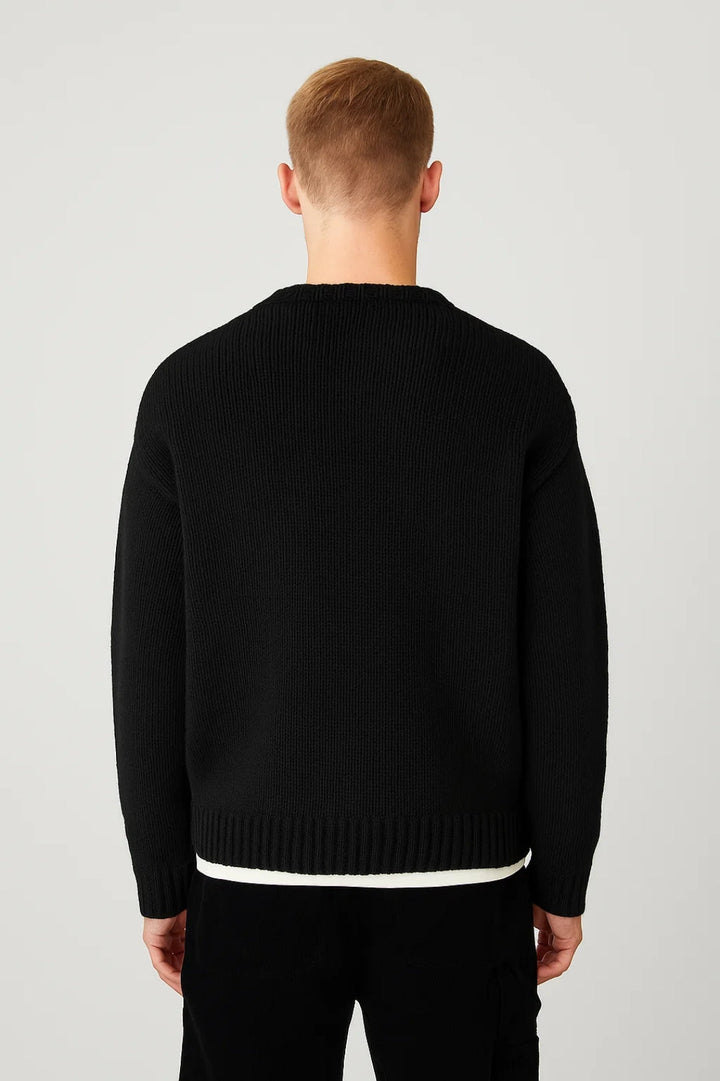 Soft knit men's oversized crew neck sweater. A warm, comfortable pullover perfect for fall and winter style.