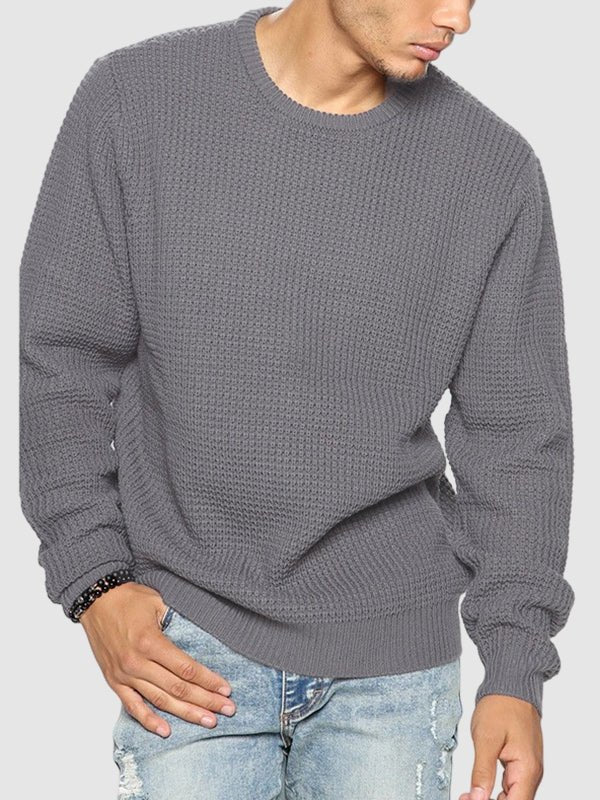 Comfortable men's knit oversized crew neck sweater. Relaxed fit for chilly days and cozy style.