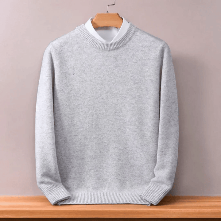 Comfortable men's oversized knit crew neck pullover sweater with a relaxed fit for everyday casual style.