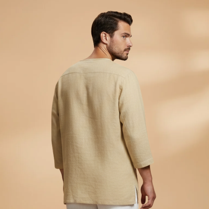 Long sleeve men's oversized shirt. Relaxed fit, button closure. Smart casual style, everyday menswear.