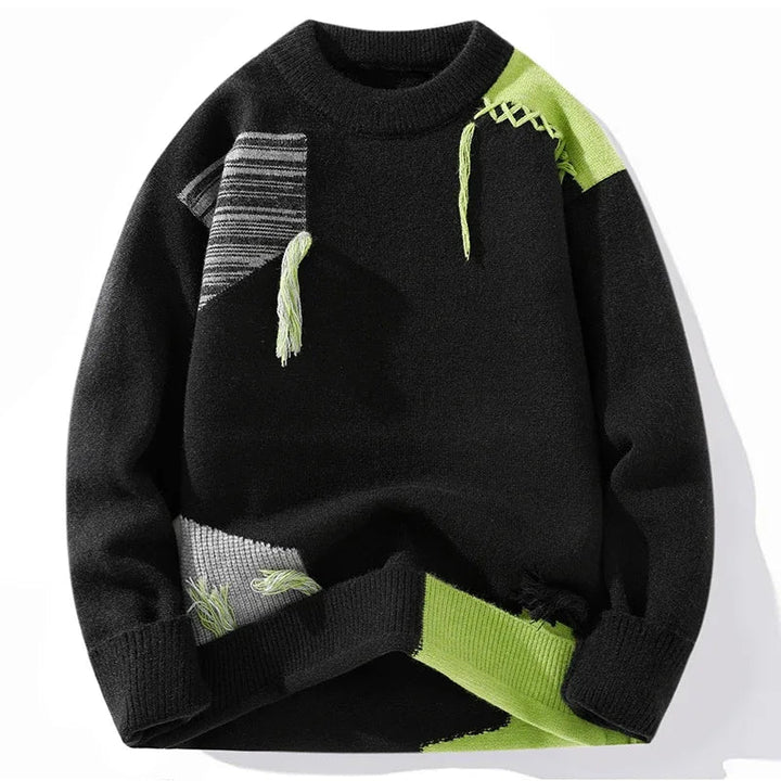 Comfortable men's oversized sweater, featuring stylish distressed patchwork and tassel details, perfect for fall.