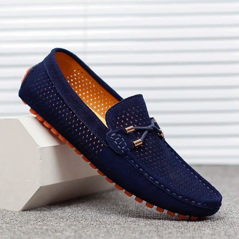 Men's perforated slip-on loafers, ideal for breathable everyday comfort & casual style.