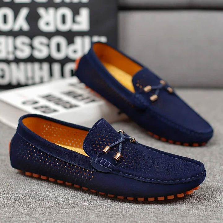 Classic men's perforated slip-on loafers, perfect for versatile spring & summer fashion.