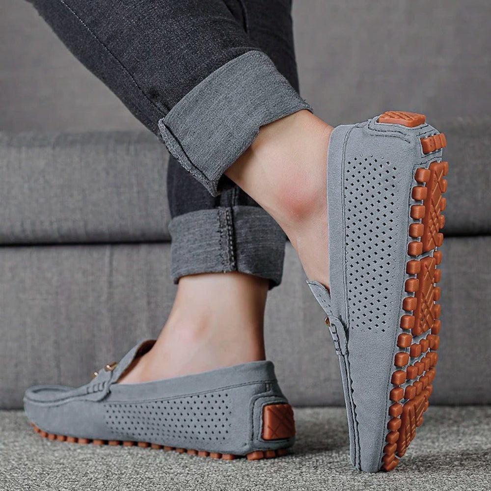 Lightweight men's perforated slip-on loafers for easy on-off, perfect for spring/summer comfort.