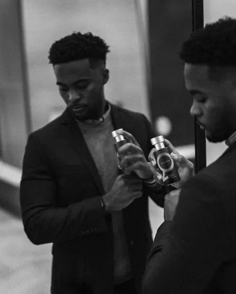 Men's Pheromone Aftershave Eau de Parfum, enhancing appeal with sophisticated fragrance & confidence.