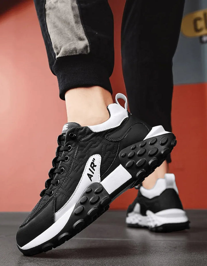 Men's platform trainers with a chunky sole, ideal for modern street style and urban fashion.