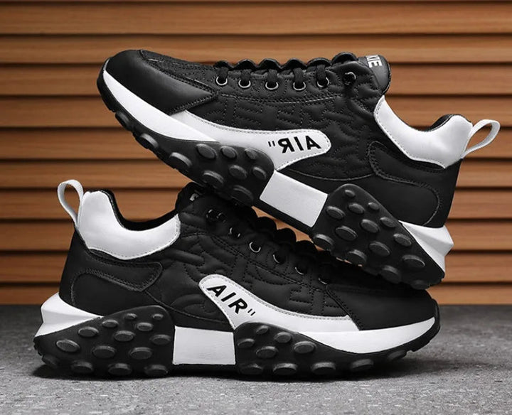 Bold men's platform fashion sneakers with a chunky sole, perfect for trendy street style outfits.