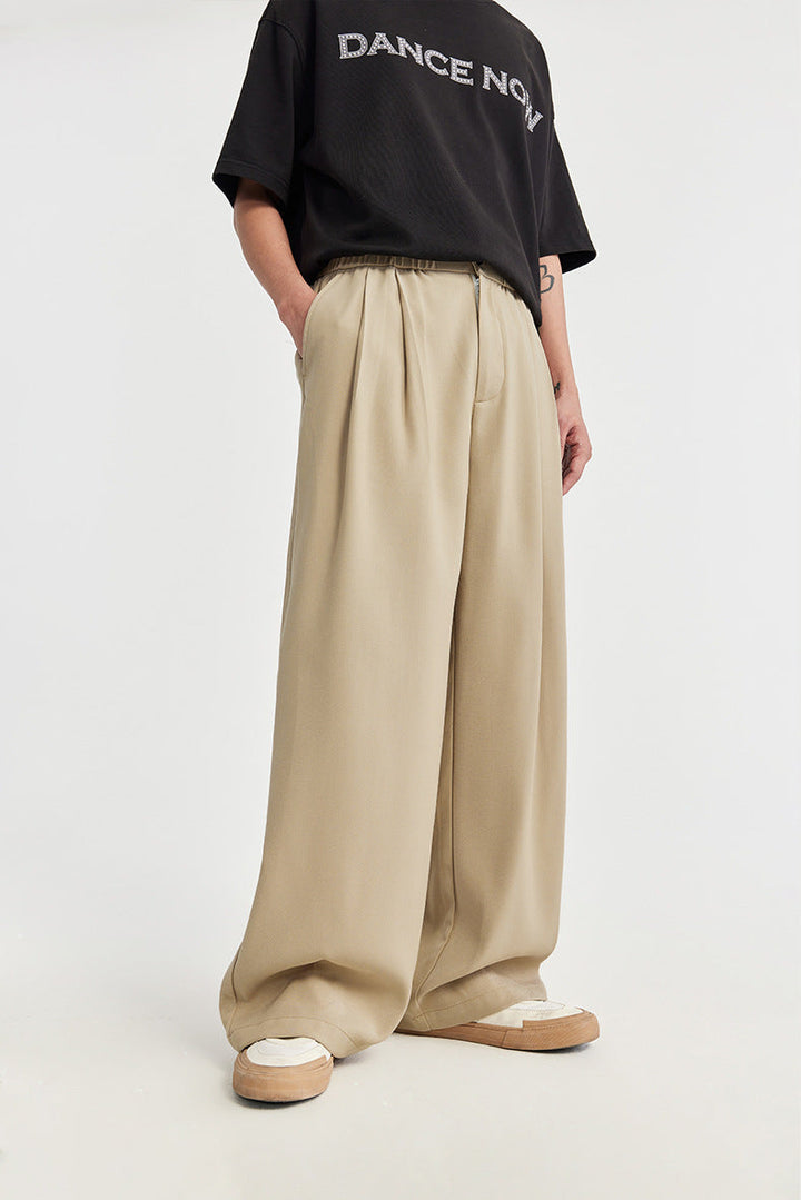 Versatile men's pleated wide leg pants. Drawstring waist ensures a relaxed, comfortable fit.