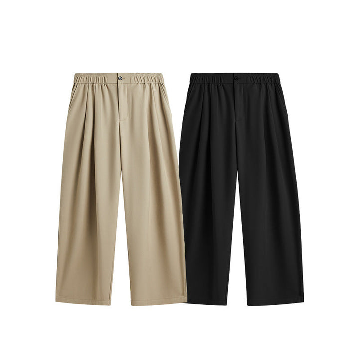 Pleated wide leg men's pants with adjustable drawstring. Designed for relaxed fit & ultimate comfort.