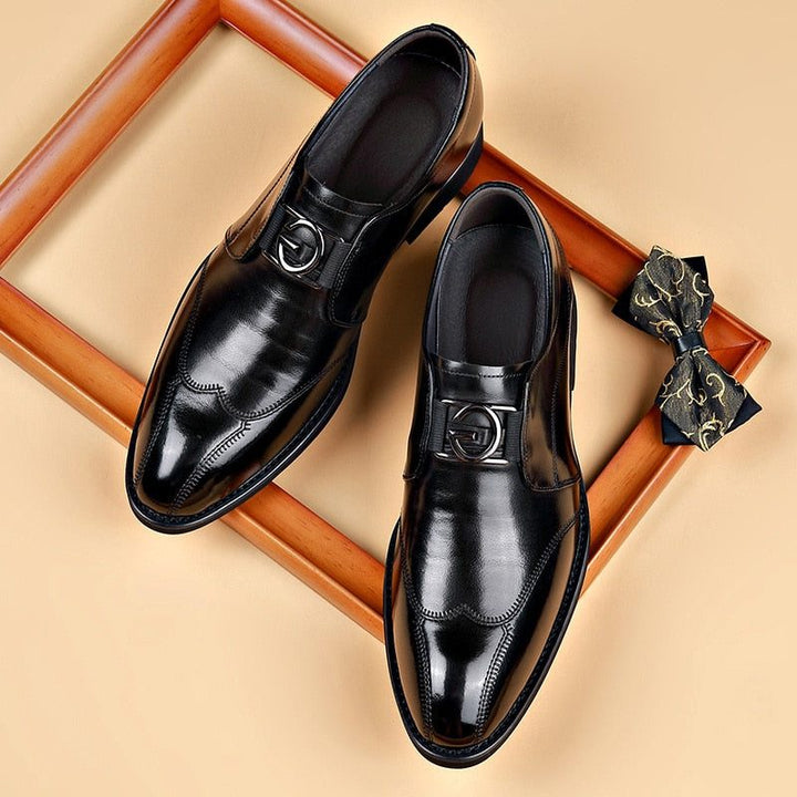 Men's formal buckle dress shoes, a pointed toe monk strap design for sophisticated office wear.