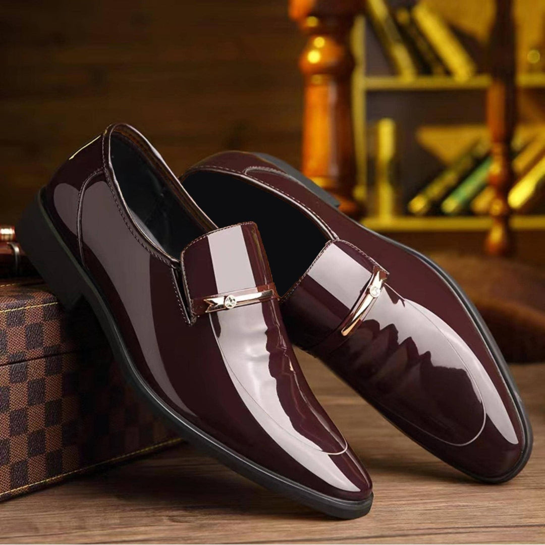 Professional men's formal dress shoes. Pointed toe slip-on penny loafers for office and business wear.