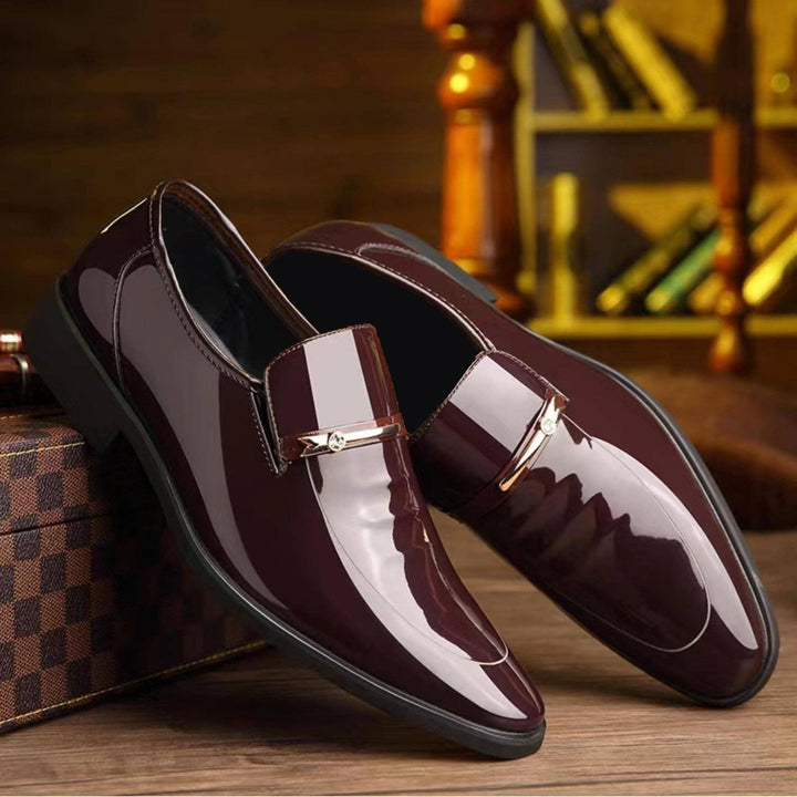 Professional men's formal dress shoes. Pointed toe slip-on penny loafers for office and business wear.