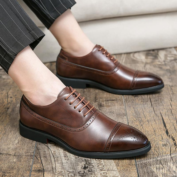 Men's polished black brogue oxford formal shoes, perfect for business attire & special occasions.